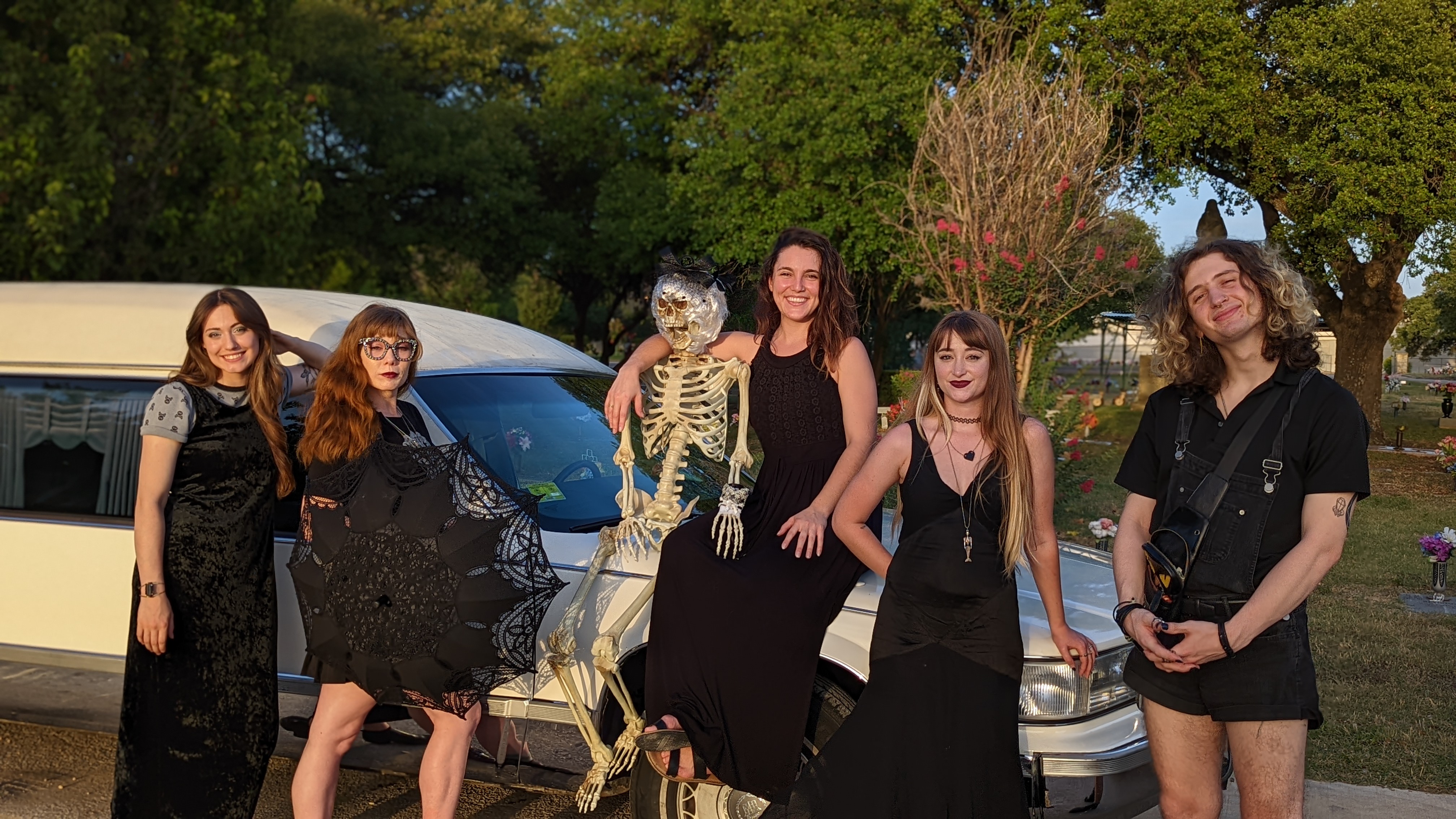 Tour group with the white hearse